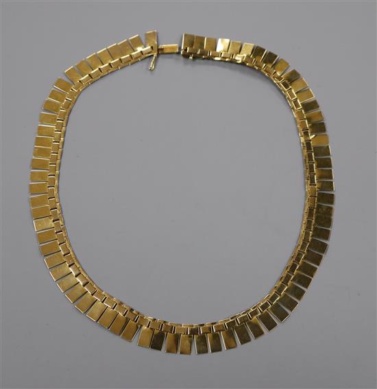 A 9ct gold fringe necklace, 42cm.